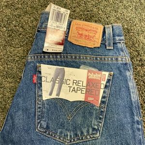 NEW with tags!  Womens 550 Levi’s , size 12 tapered leg